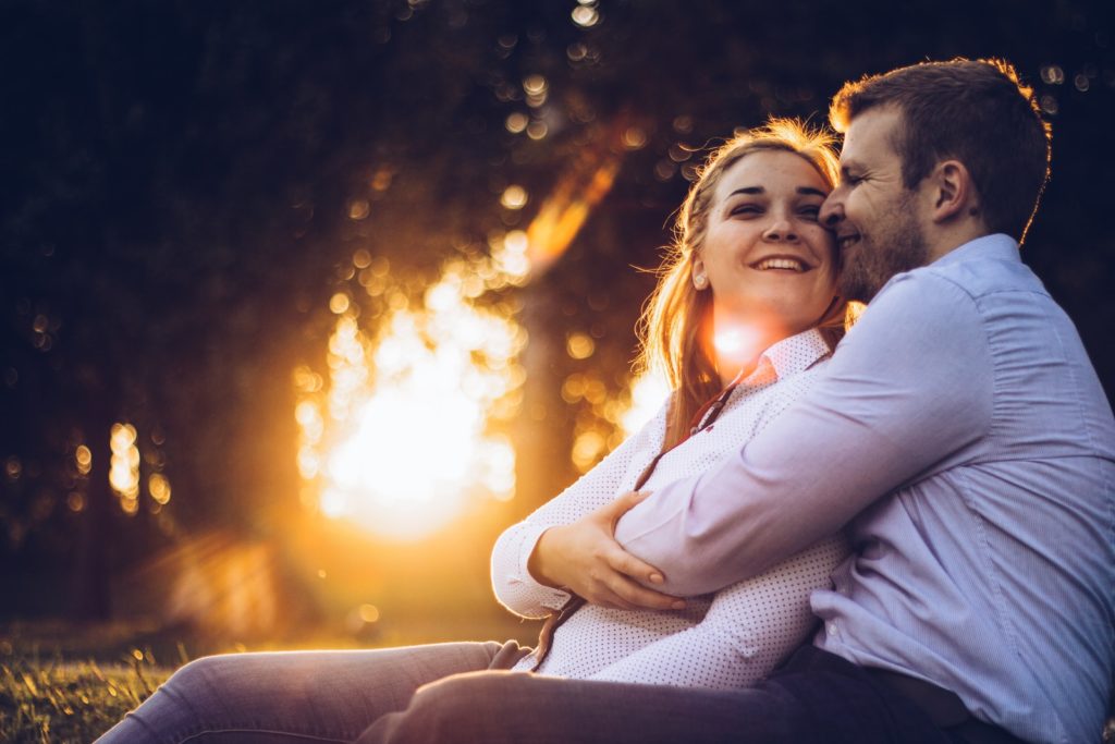 Man initiating physical affection to fix troubled relationship