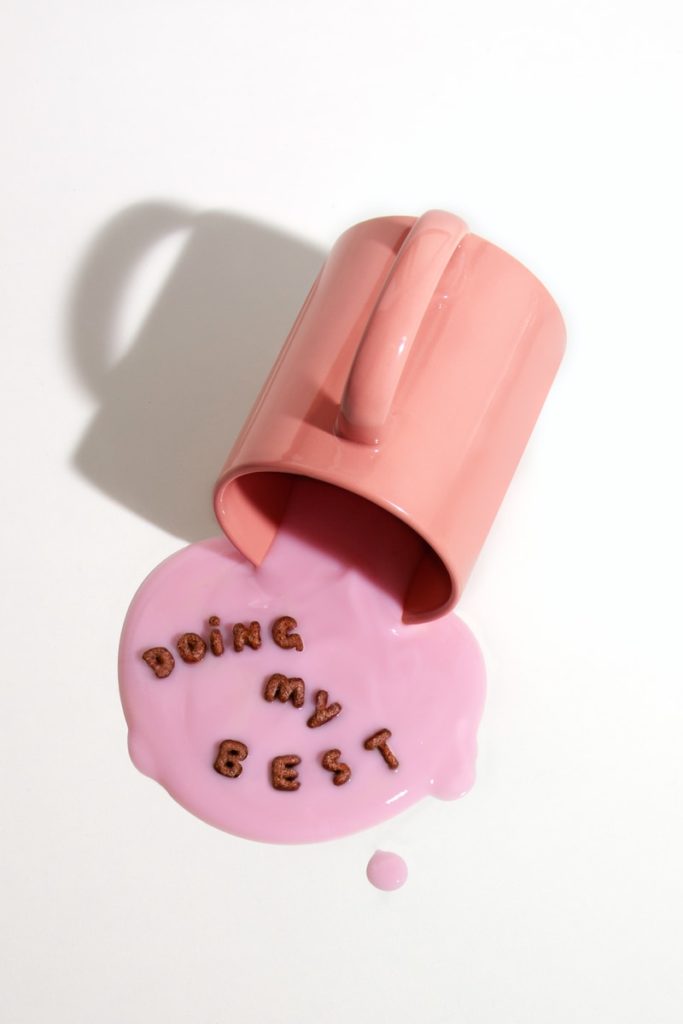 pink ceramic mug with love print